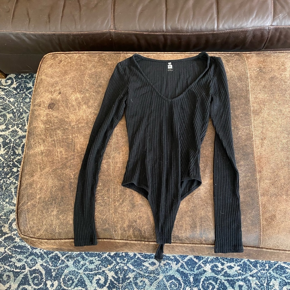 Black bodysuit, long sleeve, good condition.